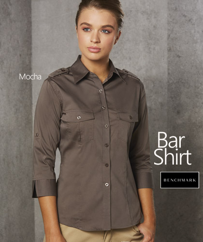 Outstanding selection of Bar Shirts for hospitality industry. The #M8913 is 60% Cotton, 35% polyester for heavy duty performance. Available in Black, Navy, Khaki, Mocha, Khaki and Stone. Logo embroidery and Printing service is available. The stretch fabric is comfortable and easier to move. Roll Up sleeves, removable epaulettes on shoulders with button tab. Enquiries FreeCall 1800 654 990